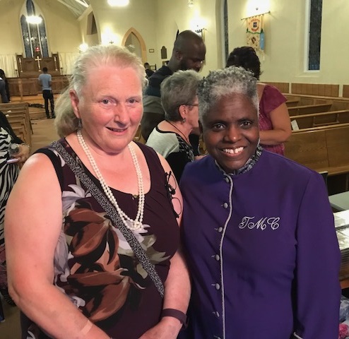 Catherin Chandler and the director of the Toronto Mass Choir following their performance at St. Luke's Church, August 2, 2018.